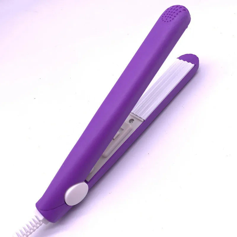 A mini electric hair iron