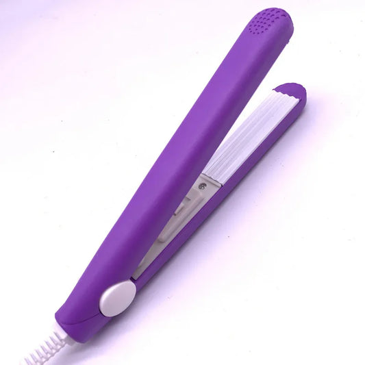 A mini electric hair iron
